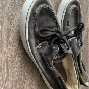 Black Sperry shoes.